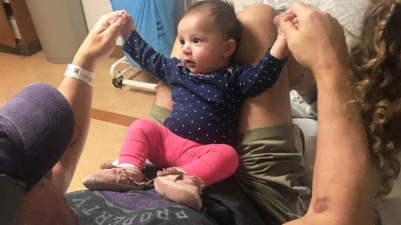 Jud Logan at Cleveland Clinic with his granddaughter. 