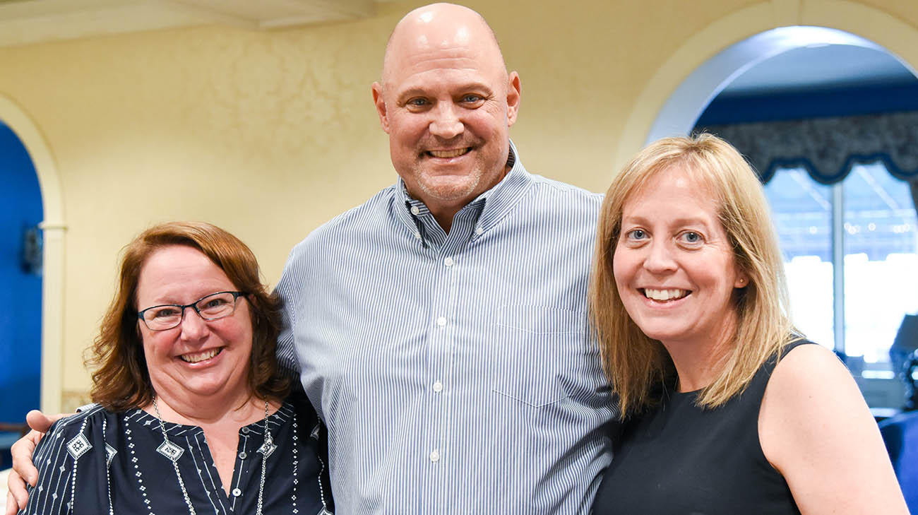 Jud Logan, his wife, Jill, and Cleveland Clinic Cancer Center's Dr. Hetty Carraway. 