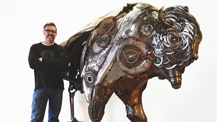 Donald Gialanella with bison sculpture