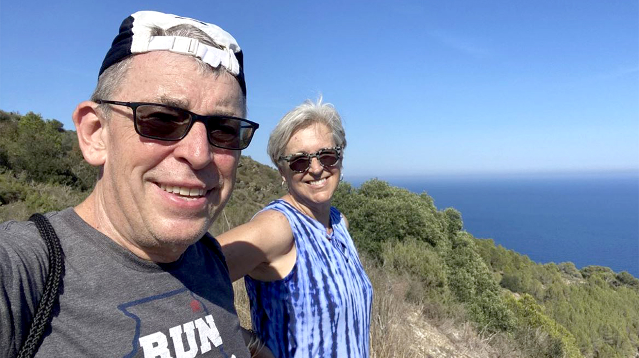 Jack hiking with his wife.