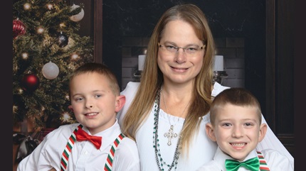 Allison Schumacher (middle) and her two sons (left and right)