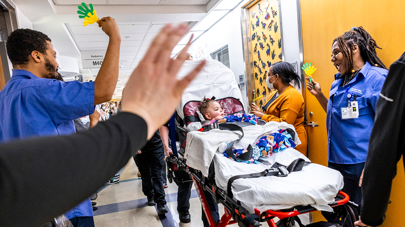 Caregivers coming together for a clap out for Bella.