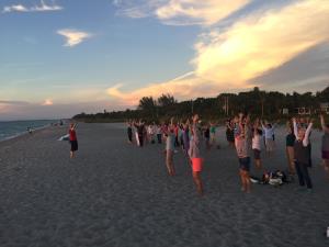 Sunset Tai Chi on the Beach at Cleveland Clinic Wellness Retreat
