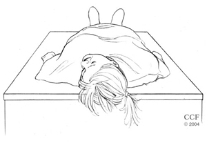Person lying down with head turned toward left ear.