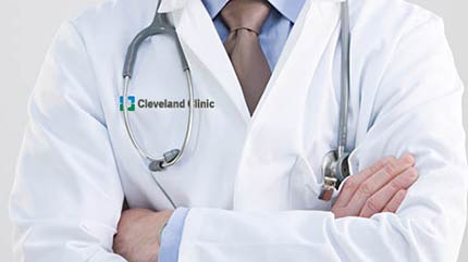 Doctor in branded Cleveland Clinic lab coat.