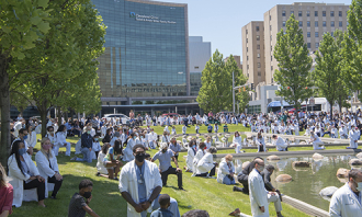 White coats for black lives image of people gathering at Cleveland Clinic