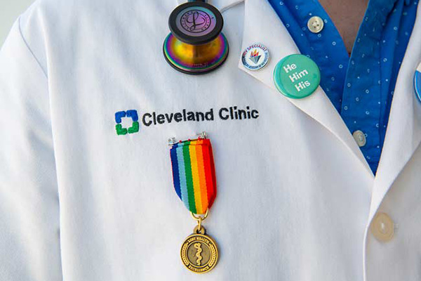 Cleveland Clinic lab coat with pride pins