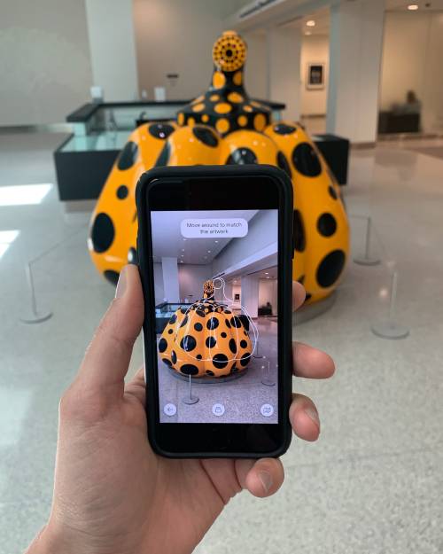 A user using AR+ scan in-person