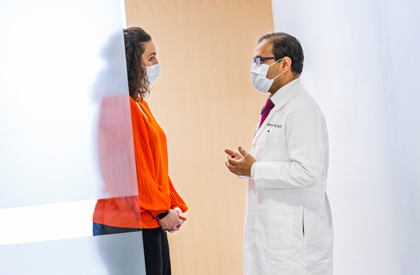 A Cleveland Clinic caregiver discussing options with a patient about Myeloproliferative Neoplasms
