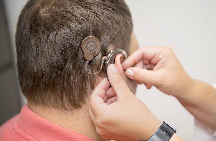 Patient being fitted with cochlear implants