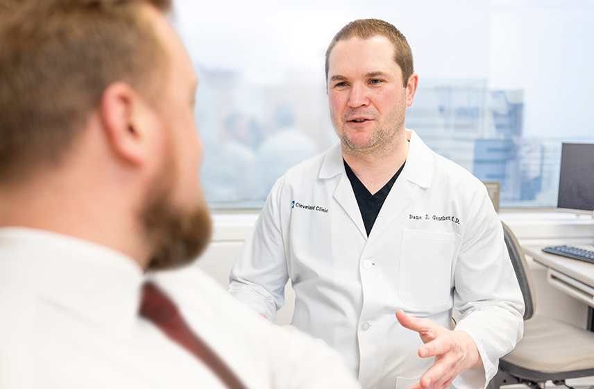 Cleveland Clinic doctor having a conversation with a patient.