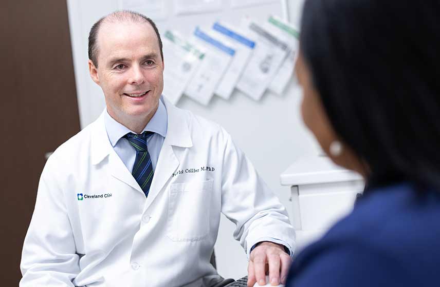 Cleveland Clinic physician talking with a patient.