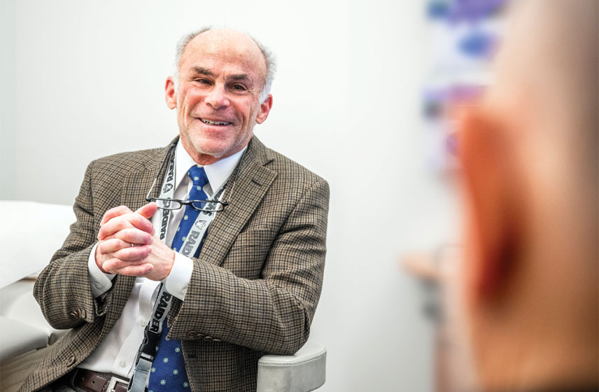 Cleveland Clinic doctor consulting a patient.