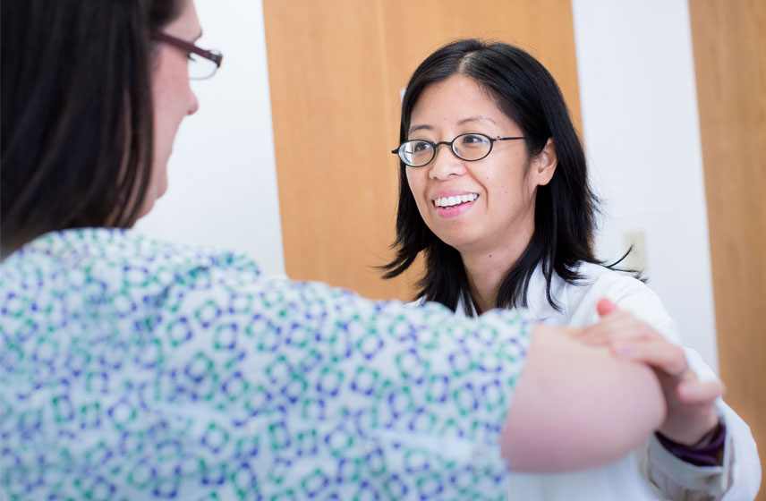 Cleveland Clinic provider consulting a patient. 