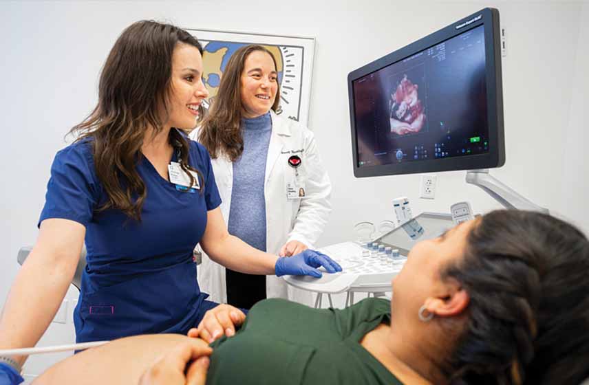 technician performing prenatal ultrasound