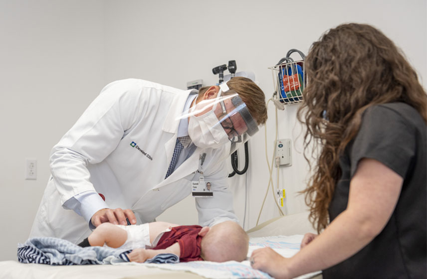 Cleveland Clinic Children's doctor examining child for tetralogy of Fallot.