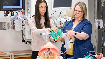 High school student with caregiver.