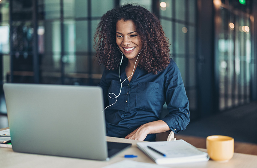 Woman working on her laptop computer.