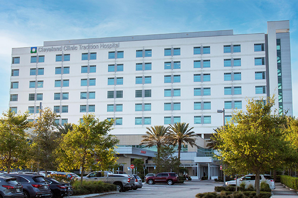 Exterior of Tradition Hospital with Cleveland Clinic logo