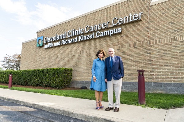 Judy and Dick Kinzel in front of the Cleveland Clinic Cancer Center, Judith and Richard Kinzel Campus in Sandusky, Ohio.