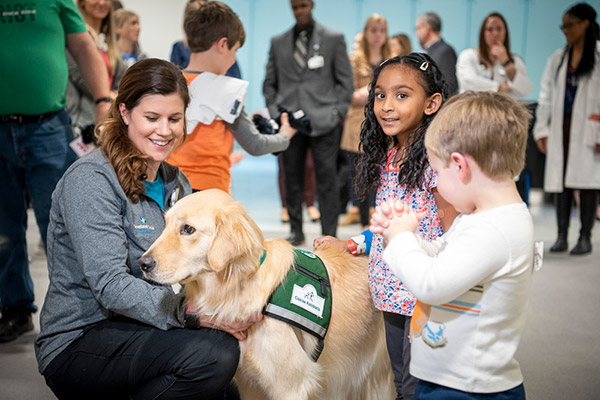 Cleveland Clinic's Dogs for Joy facility dog Kid is introduced to pediatric patients
