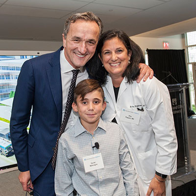 Cleveland Clinic CEO and President Tom Mihaljevic, MD, celebrates the opening of the new outpatient center on Sept. 14 with Cleveland Clinic Children's patient Daniel Melaragno and Cleveland Clinic Children's Interim Chair Rita Pappas, MD.