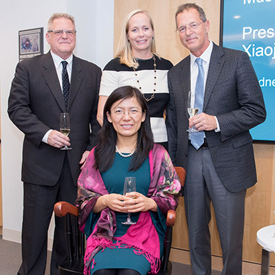 Boris Bonutti (l), Simone Bonutti and Dr. Peter Bonutti congratulate Xiaojuan Li, PhD, as the inaugural holder of the Bonutti Family  Endowed Chair for Musculoskeletal Research.