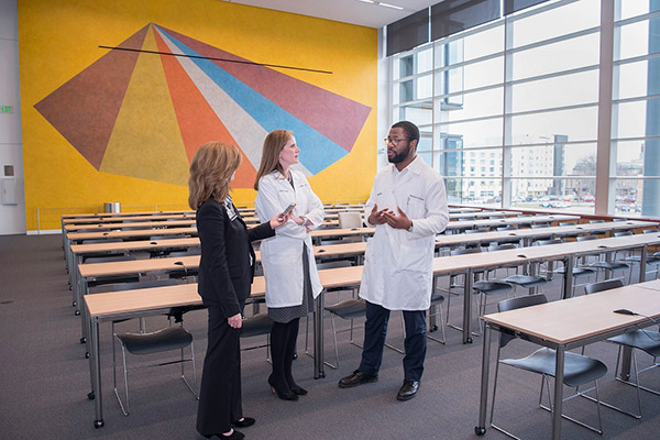 Author Jill Stefancin with Christine Warren, MD, and medical student Anthony Onuzuruike 