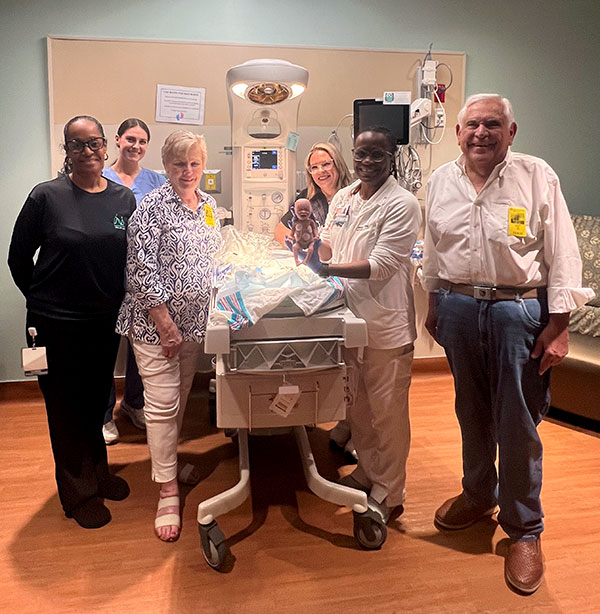 Charles A. "Charlie" and Geraldine C. "Gerry" Ruibal with neonatal staff at Cleveland Clinic Tradition Hospital