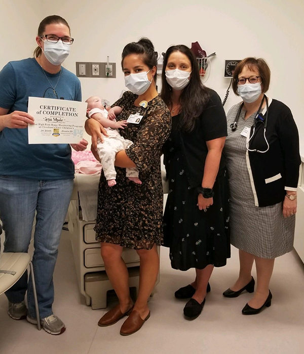 Pictured left to right: Randi Wheeler-Grace's mom, Alexandria Gill, MSN, RN, RNC-NIC- holding grace, Dr. Francine Erenberg, Medical Director, Jodi Zalewski, MSN, CPNP-AC, Program Coordinator