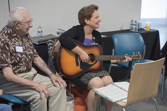 Becky Wellman, PhD, leads a music therapy session at Cleveland Clinic Lou Ruvo Center for Brain Health