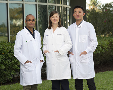 Left to Right: Dhiraj Acharya, PhD, Research Associate, Michaela Gack, PhD, Scientific Director, Florida Research and Innovation Center, Guanqun ( Leo) Liu, PhD, Postdoctoral Fellow