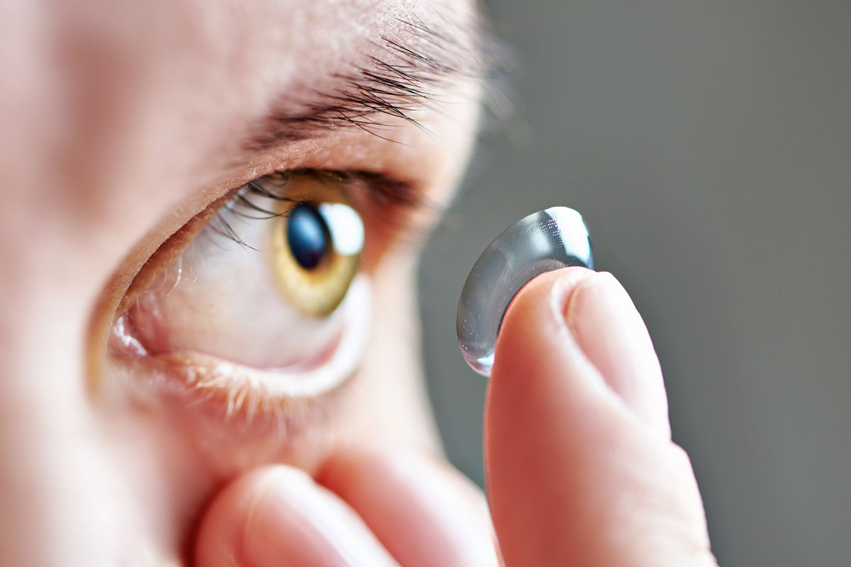 Photo of someone preparing to put in a contact lens.