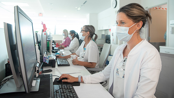 Cleveland Clinic nurse typing on computer