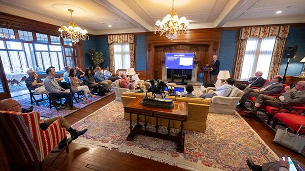 Research presentations in front of director and program faculty.