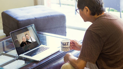 Man video chatting with parents