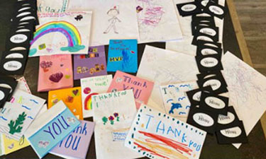 Some of the artwork and gift cards sent to Medina caregivers