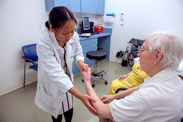 Dr. Ulep-Reed diagnoses a patient at Cleveland Clinic Nevada.