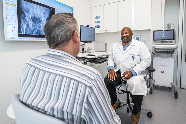 Dr. Blackwell talking to patient