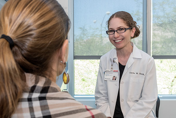 Carrie Hersh, DO discusses options with an MS patient at Cleveland Clinic Nevada.