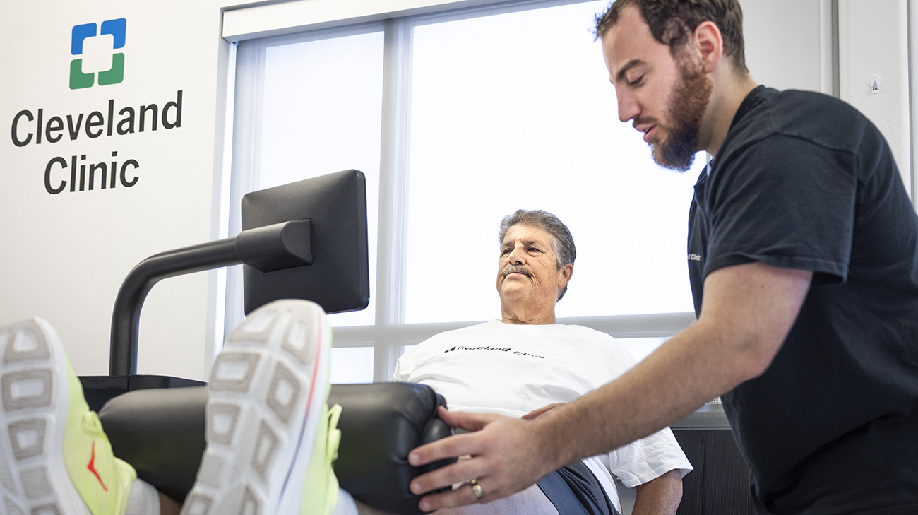 Nick with exercise physiologist Brad Heiss at Cleveland Clinic's Langston Hughes Community Health and Education Center.