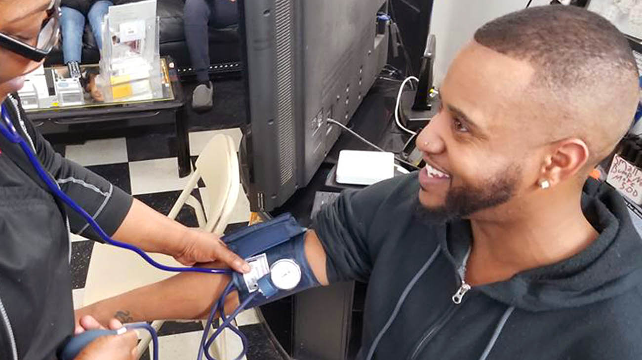 Blood pressure screening at Waverly Willis' barbershop