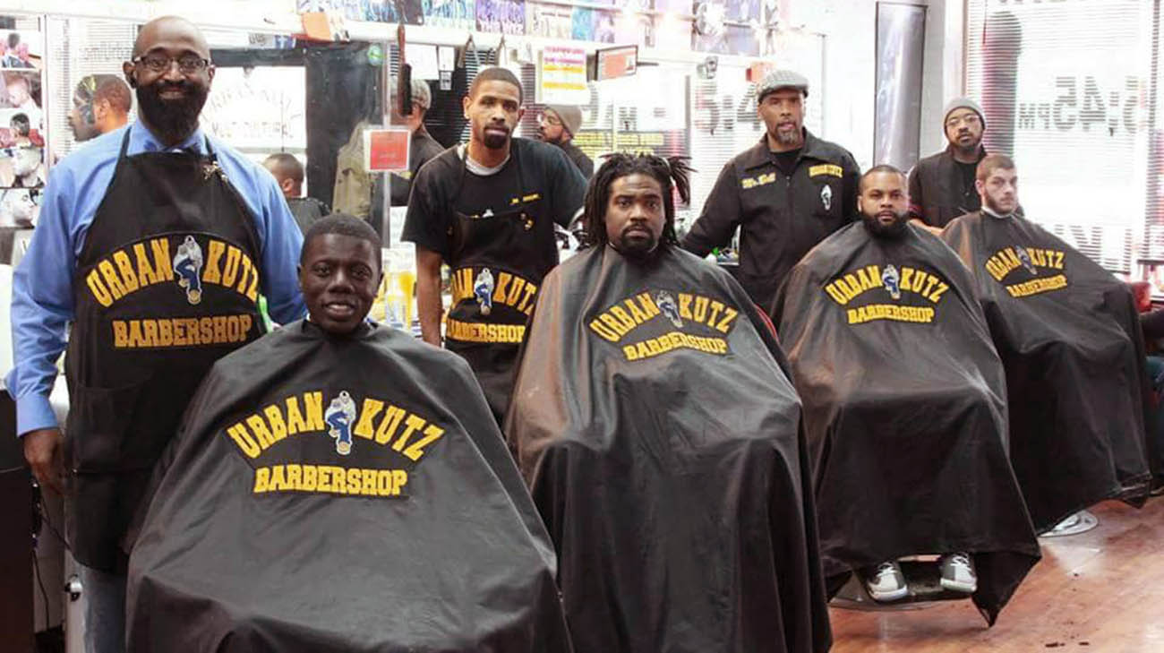 Waverly Willis and fellow barbers at barbershop 