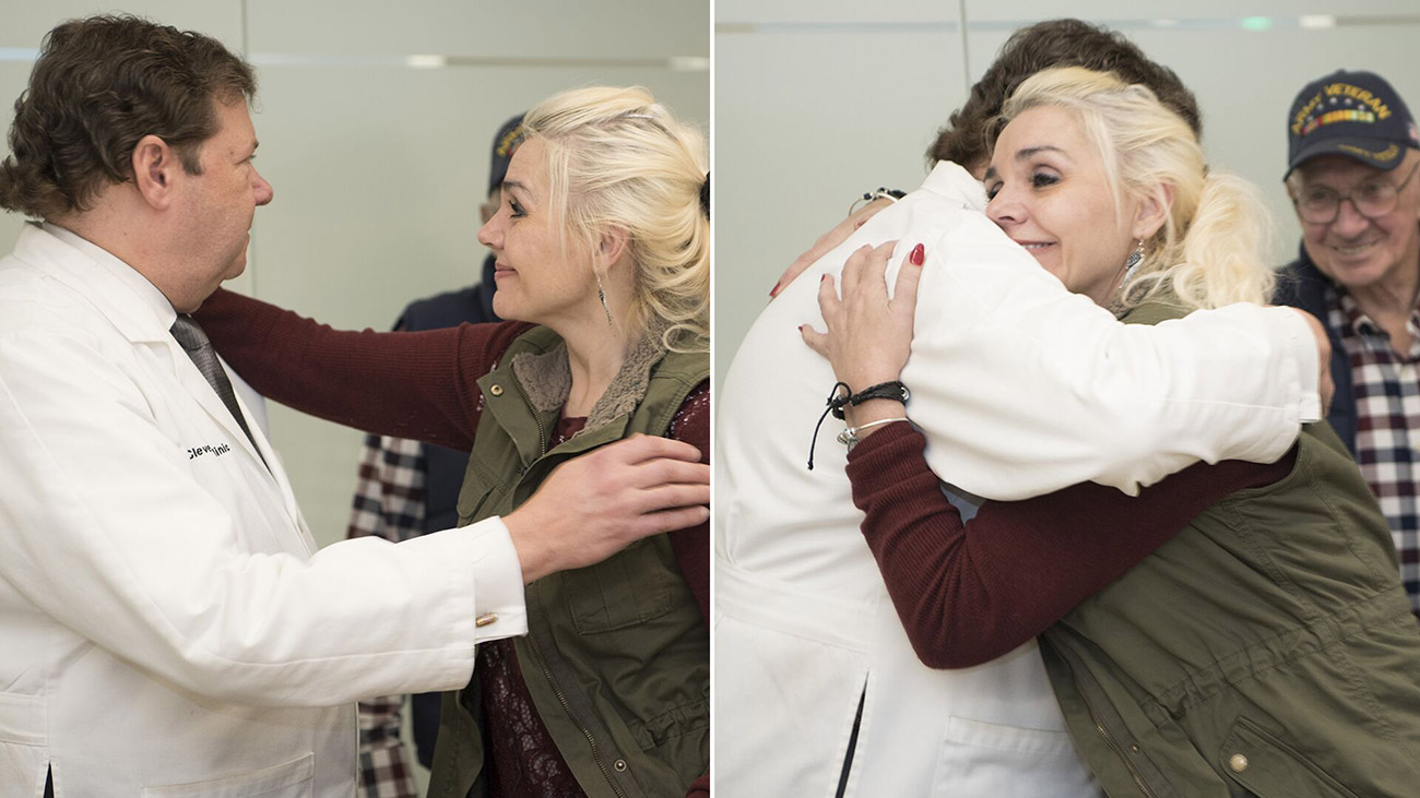 Rachel Given hugging Dr. Barnett, for the first time, after brain cancer treatment, 18 years ago.
