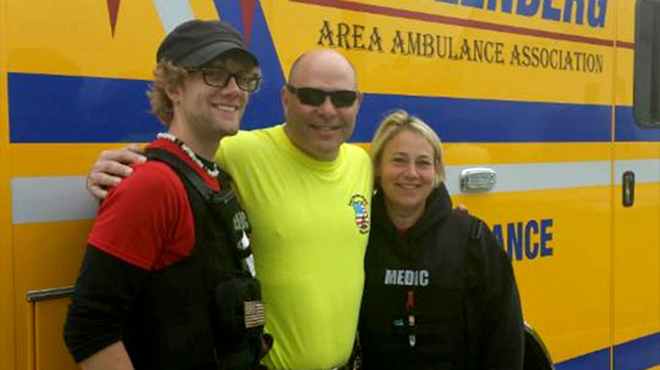Jim with the paramedics who saved his life, Jake Motacki and Kelly Hackman. (Courtesy: Jim Mariano)