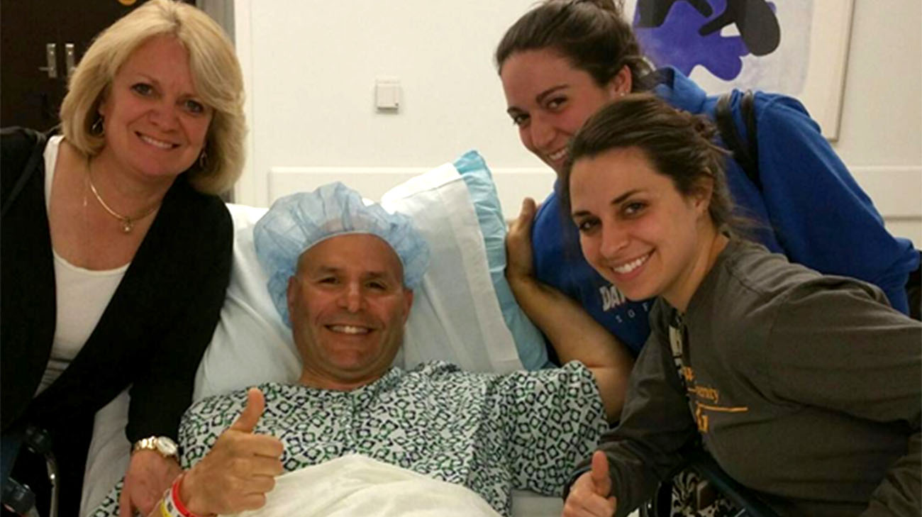 Jim, with his wife and two daughters, after receiving surgery at Cleveland Clinic. (Courtesy: Jim Mariano)