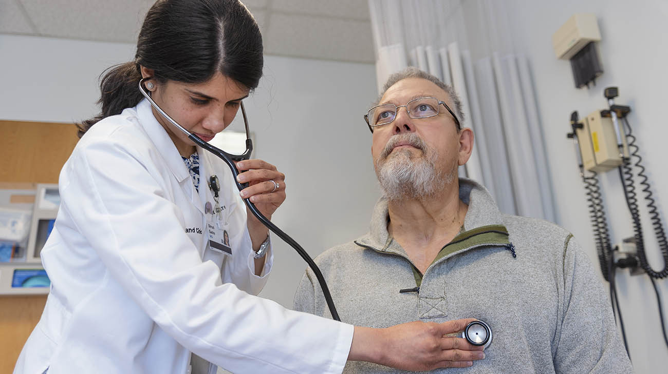 Lung transplant and triple bypass patient Ed Meyer with Cleveland Clinic pulmonologist Dr. Shruti Gadre 