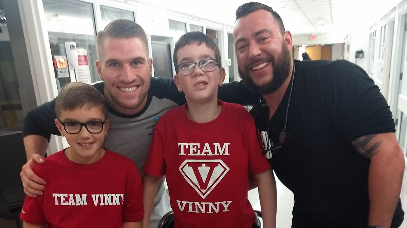 Pediatric stroke patient Vinny Mercurio with his brother and ICU nurses at Cleveland Clinic Children's