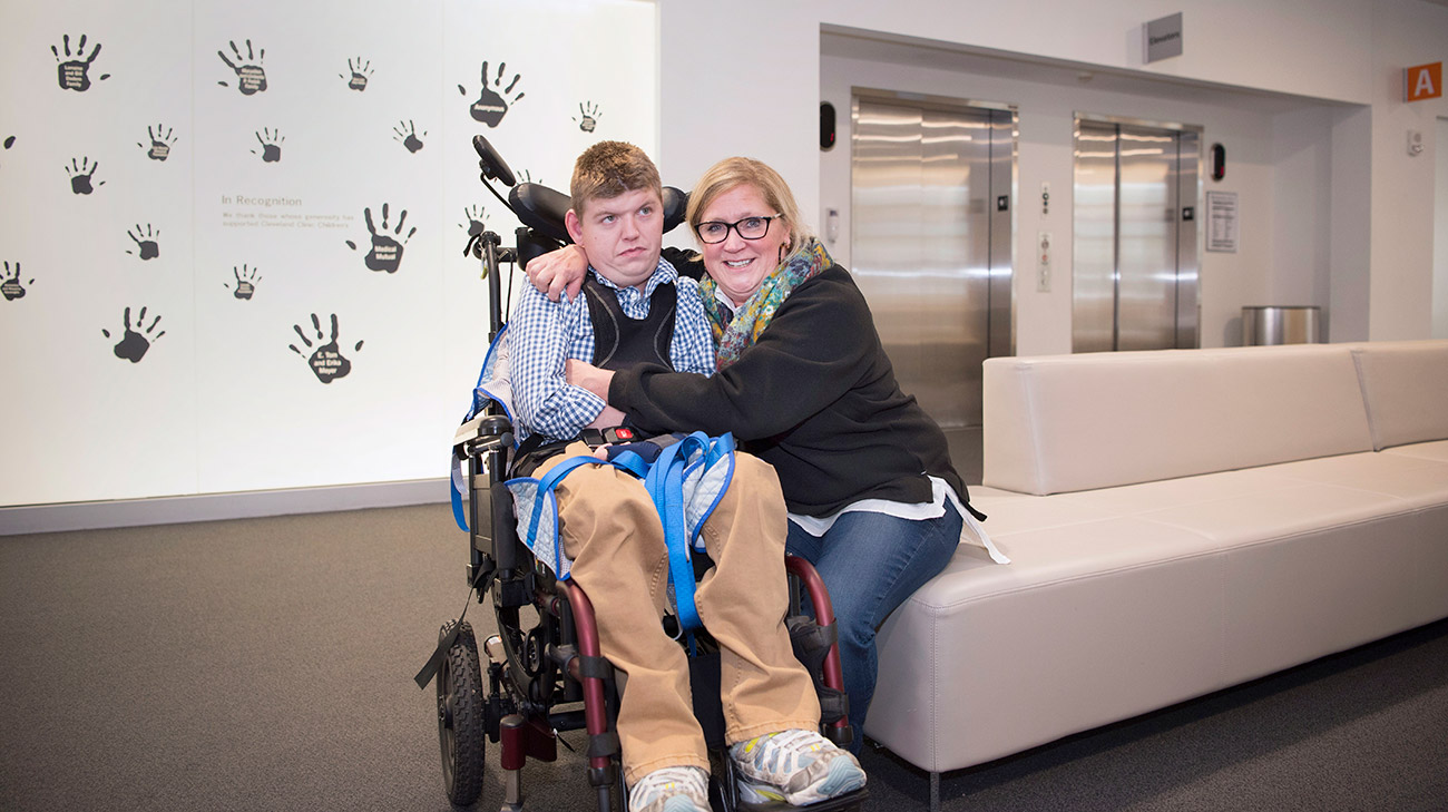Thomas and Sue Rice wait for their final appointment at Cleveland Clinic Children’s before Thomas transitions to adult care. (Courtesy: Cleveland Clinic)