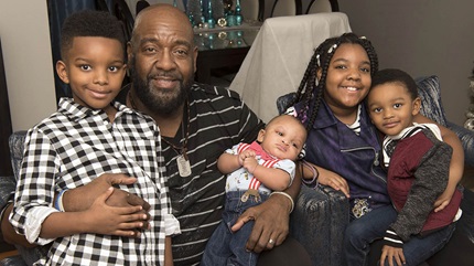 Diabetic retinopathy patient, Mark Campbell with his grandkids. 
